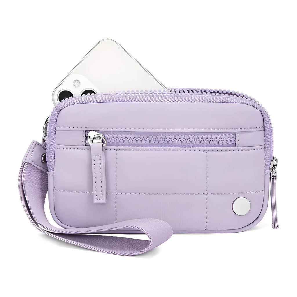 Women's waterproof quilted handbag in a light colour with a transparent front deck panel.