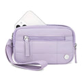 Women's waterproof quilted handbag in a light colour with a transparent front deck panel.