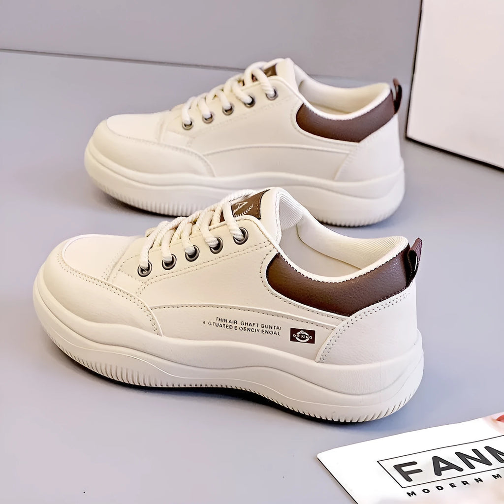 Women's white Korean-style leather pumps with cross straps and a 3-5cm mid heel on a rubber sole.