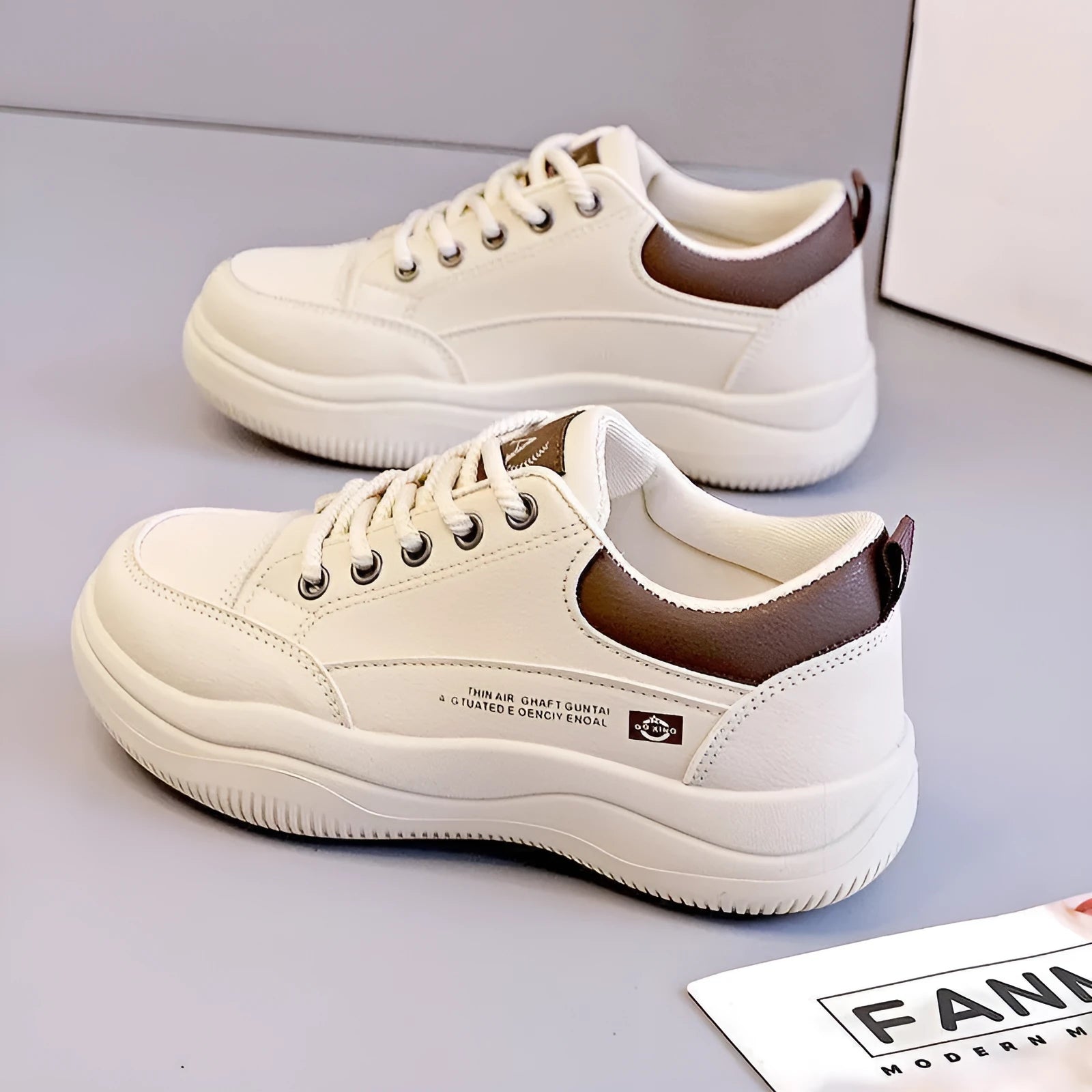 Women's white Korean-style leather pumps with cross straps and a 3-5cm mid heel on a rubber sole.