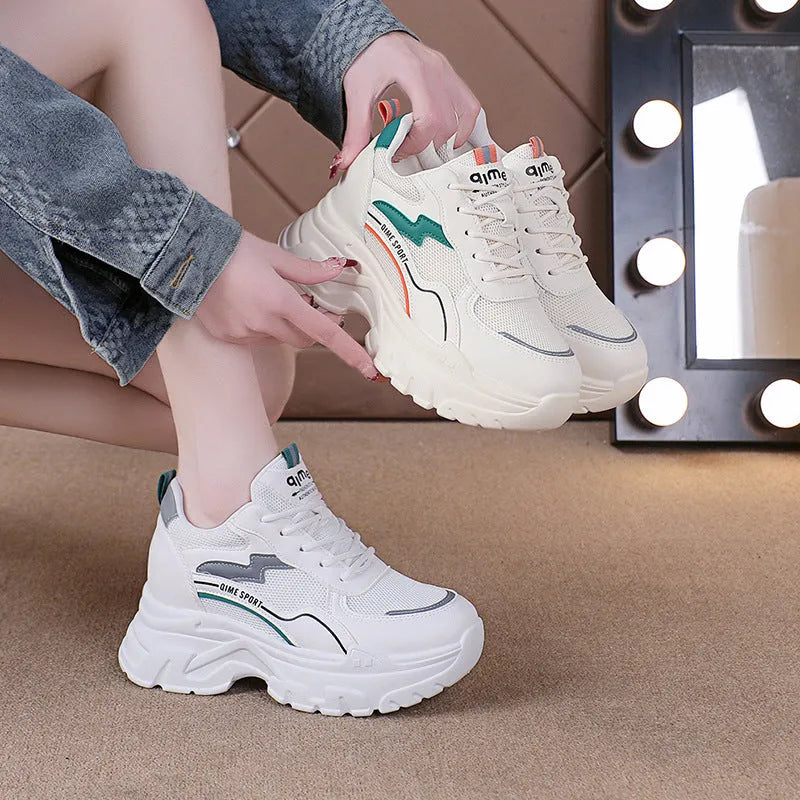 Women's white breathable dad shoes with cross strap and lace-up design, featuring height-increasing insoles.
