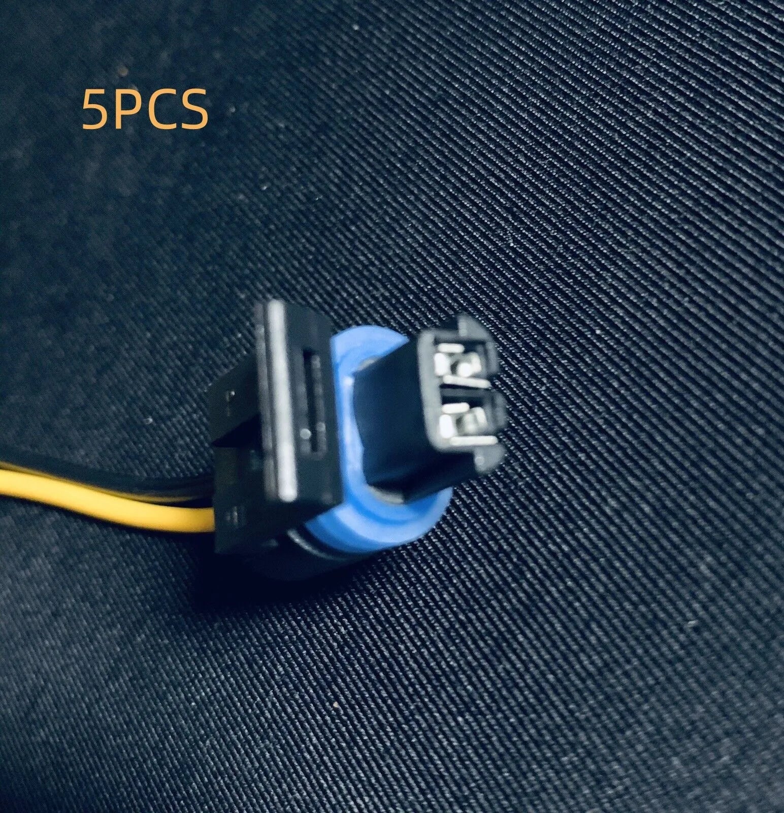 ACDelco engine coolant temperature sensor plug for automotive side light replacement.