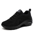 Women's black mesh sneakers with round toe and lace-up design, flat heel and low-top construction