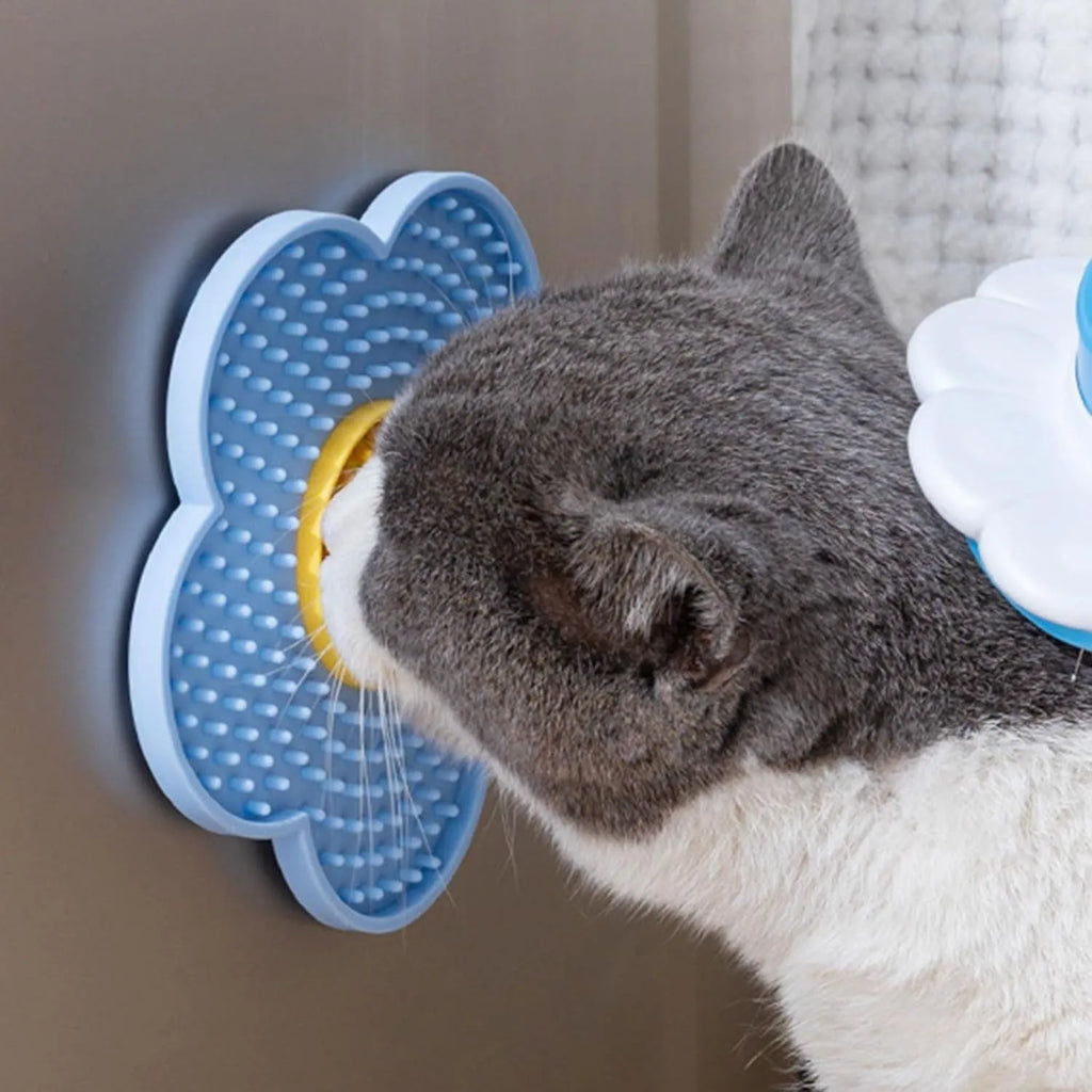 Flower-shaped silicone pet lick mat with suction cups on the base, shown in a choice of colours.