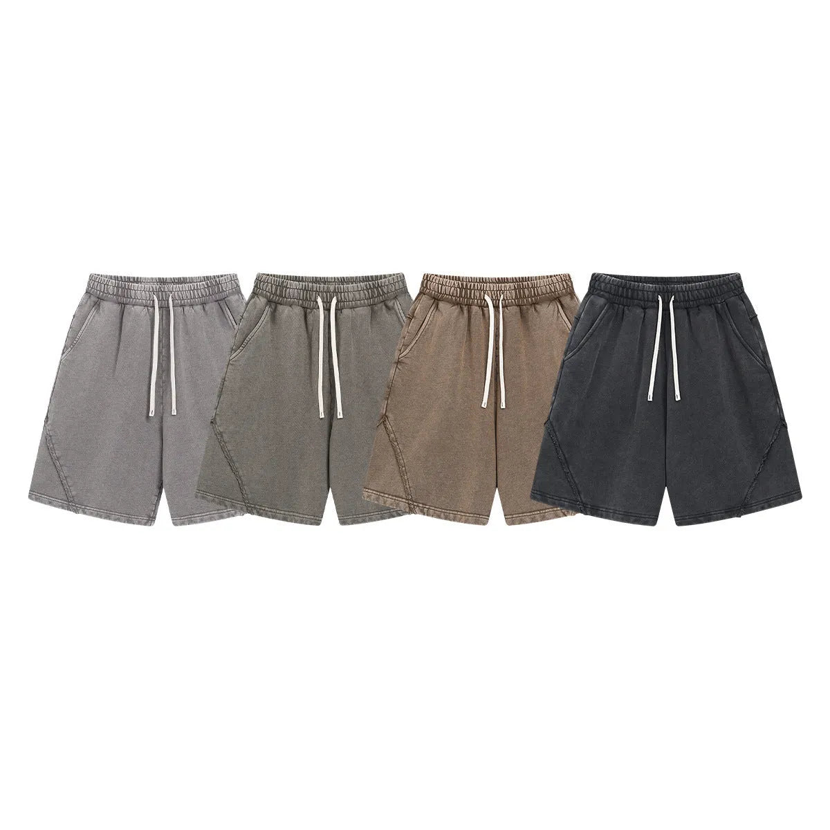Man's loose-fit cotton terry shorts in a batik wash colour, showing street-style casual design.