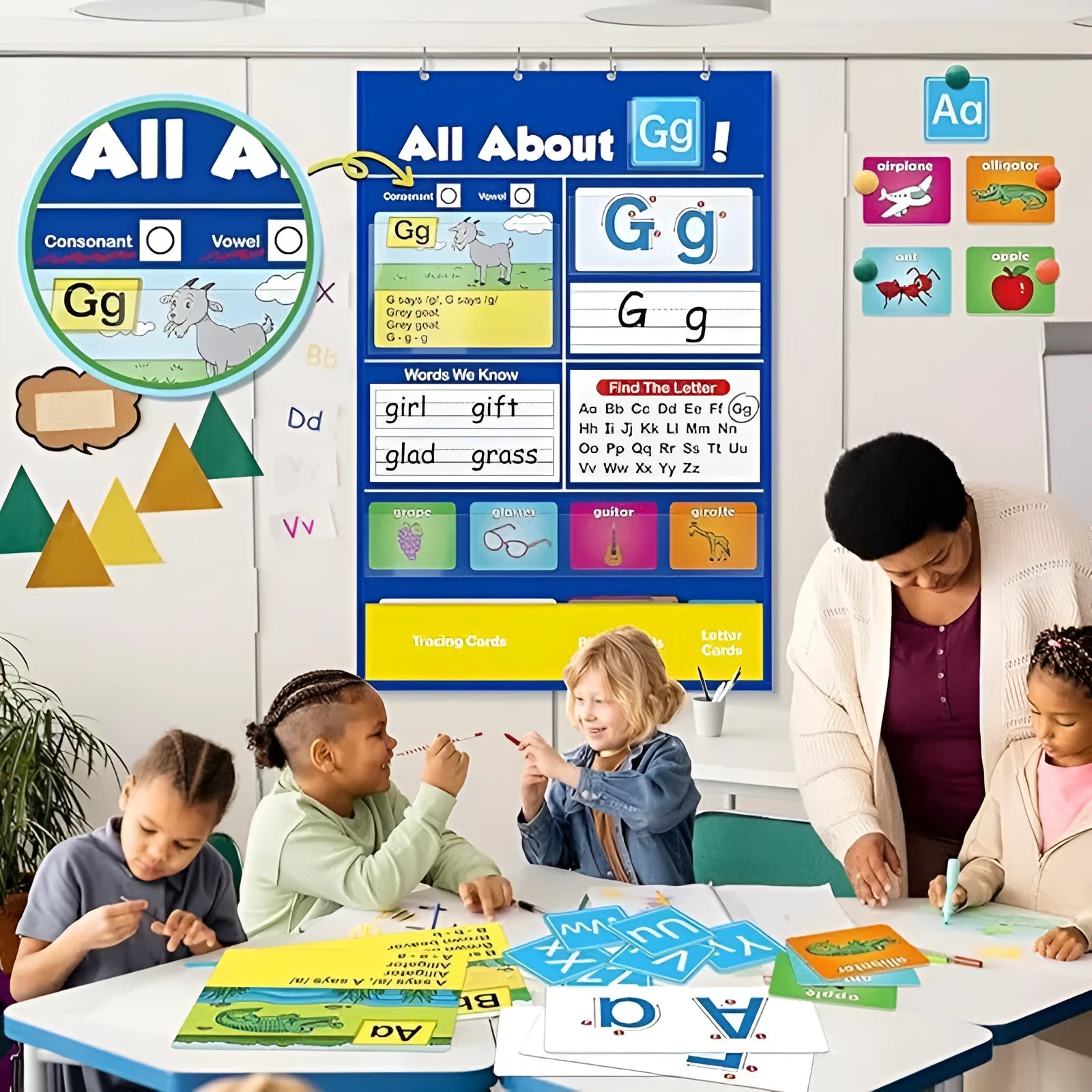 Alphabet learning chart with word cards, letter cards, and picture cards displayed on a 60cm by 40cm sleeve table.