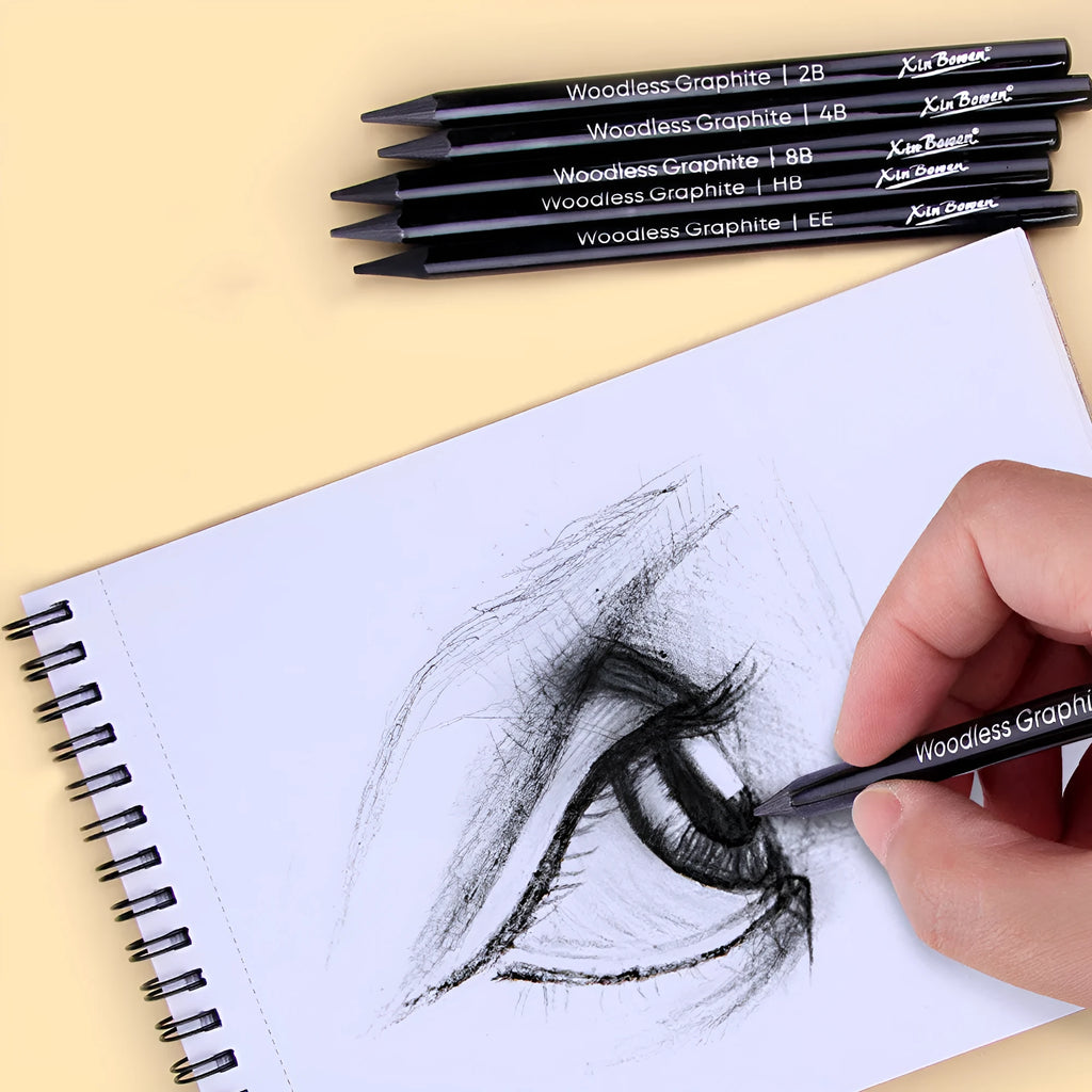 Wood-free graphite sketching pencils set showing six different hardness grades for art drawing