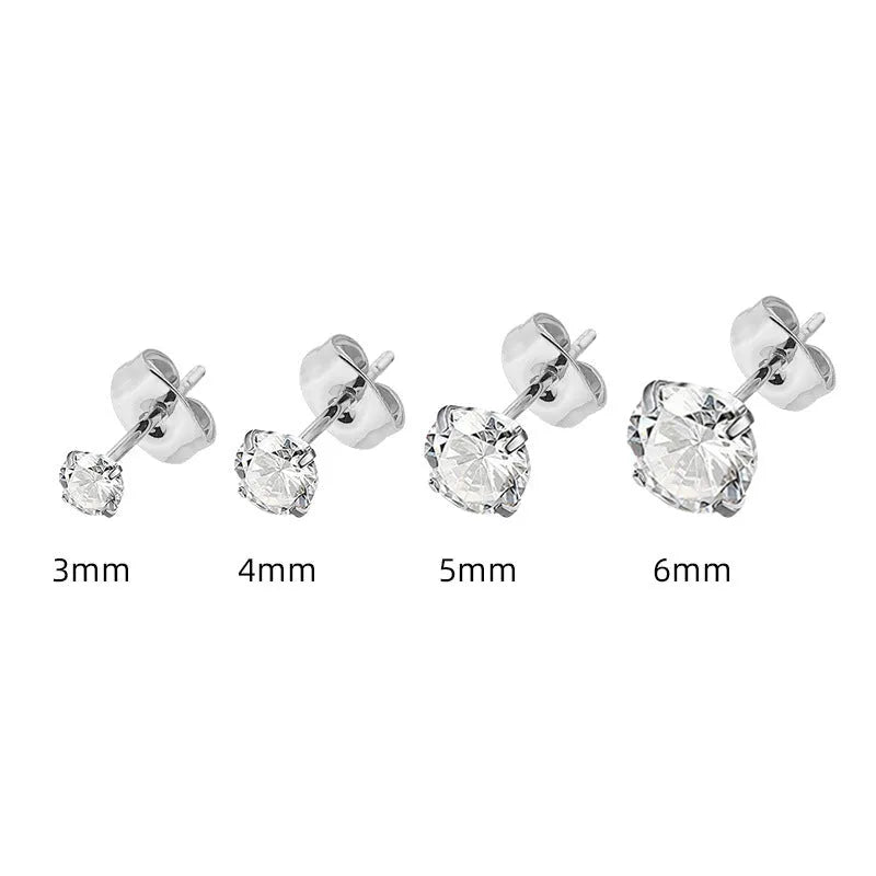 Simple geometric stud earrings with a round zircon stone on a stainless steel post, available in gold or steel colour.