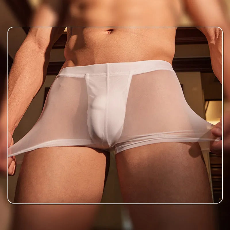 Men's black ultra-thin nylon boxer briefs on a white background, showing elastic waistband.
