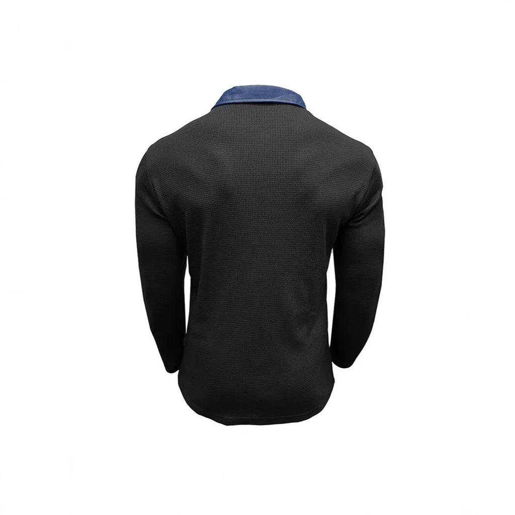 Man wearing a long-sleeved waffle-texture polo shirt in a solid colour, showcasing the retro style and asymmetric detail.