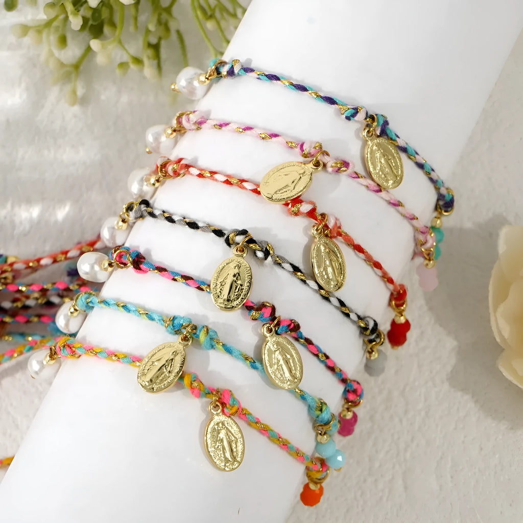 Colourful hand-woven braided rope bracelet with an ethnic style strap tag for women.