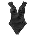Women's black polypropylene steel support bikini brief swimsuit on display