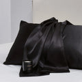 Solid colour satin pillowcase pair showing plain weave texture and available in multiple colour options