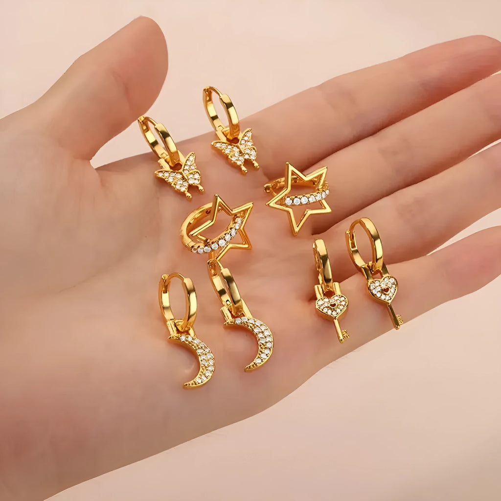 Women's copper butterfly earrings with heart and star geometric details in various colours.