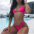 Ladies fashion hollow out polyester bikini set in black, showing swim top and high-waist briefs