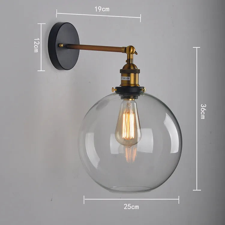 Round glass wall lamp with aluminium holder in transparent, amber, or smoky grey colour options