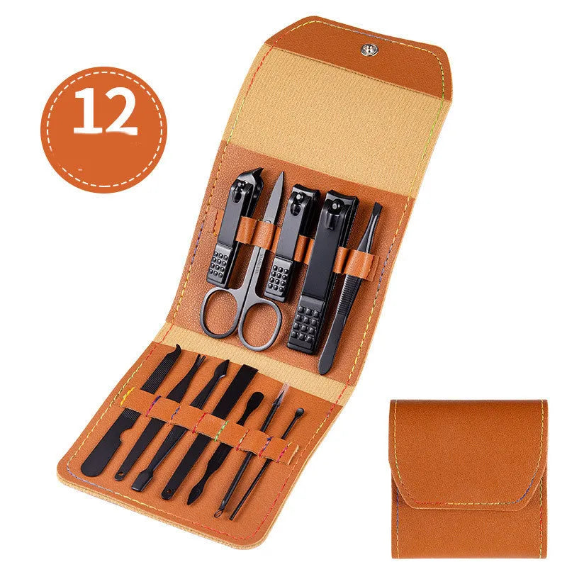 Black leather case containing stainless steel manicure tools with nail clippers and scissors