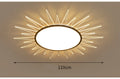 Modern round aluminium LED ceiling lamp with remote control for dimmable tricolour light.