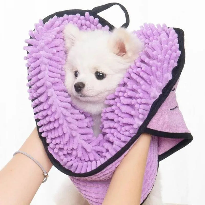 Blue quick-dry pet bath towel shown draped, sized 62 cm by 23 cm for drying dogs and cats.