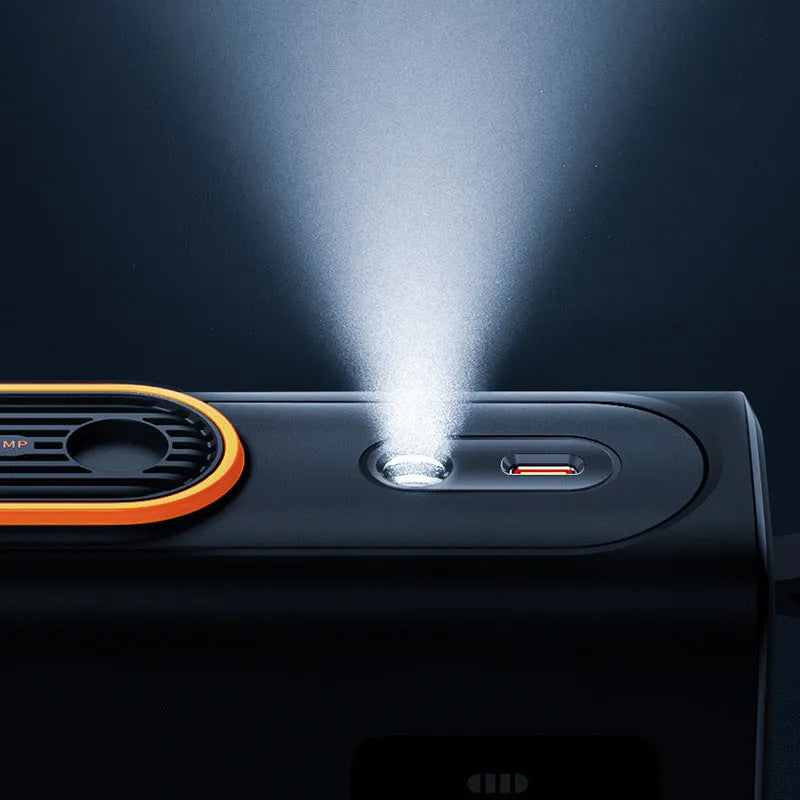 Black portable car tyre inflator with LED light display showing 6000mAh battery capacity