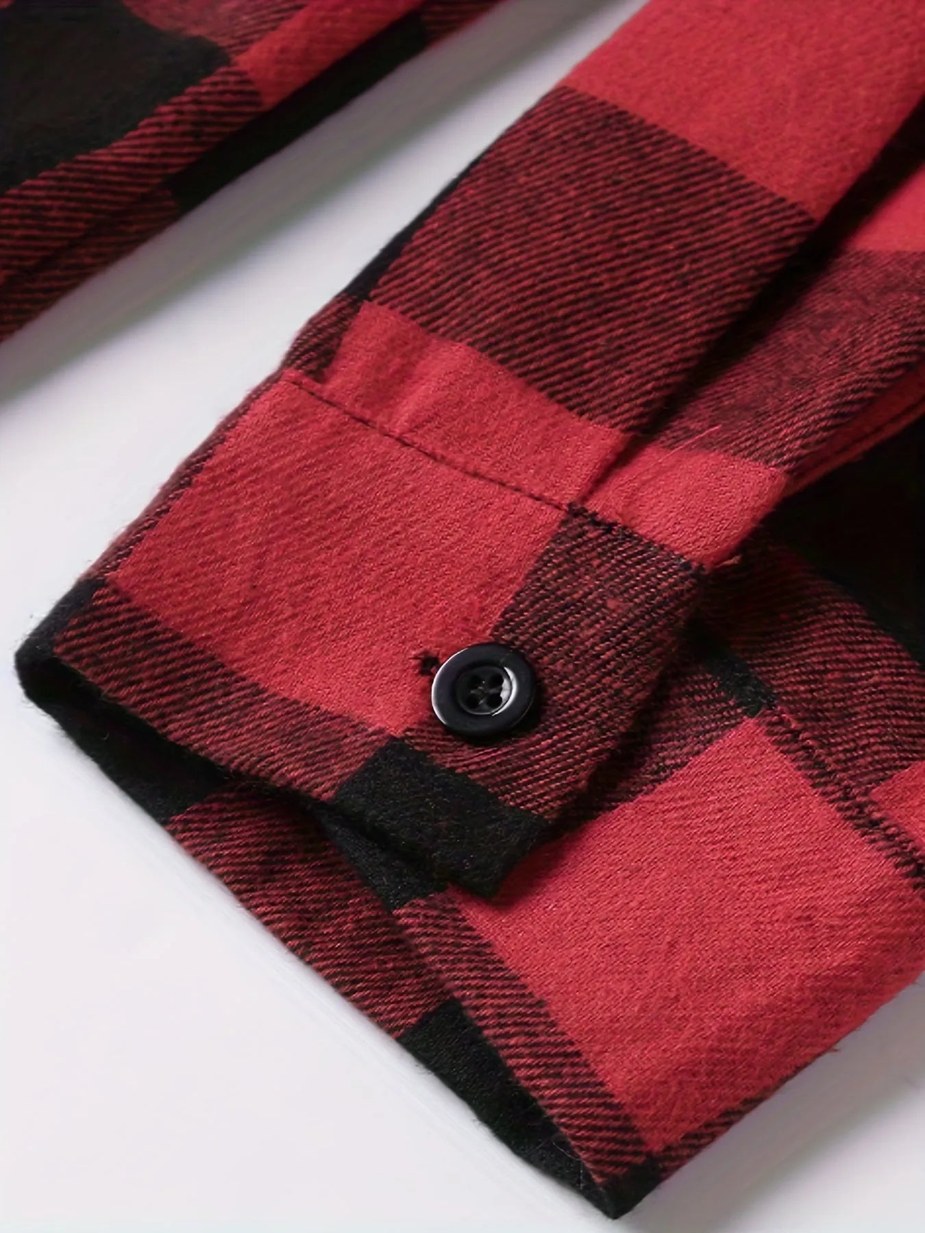 Teenage men's red and black checked long-sleeved casual shirt with button-front closure