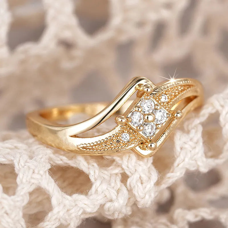 Women's copper diamond ring with geometric design and micro inlaid zircon stones in yellow gold finish