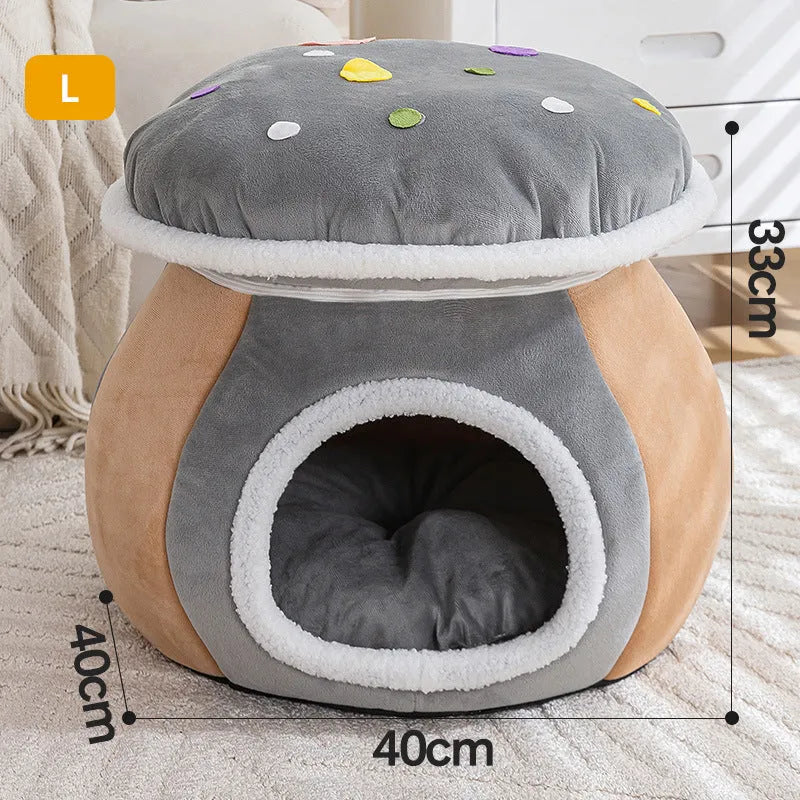 Grey mushroom-shaped plush cat bed on a wooden floor