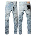 Black men's slim fit cotton jeans with a straight leg and button fly closure on a plain background.