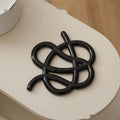Ceramic heat proof mat in irregular shape protecting table from hot pot