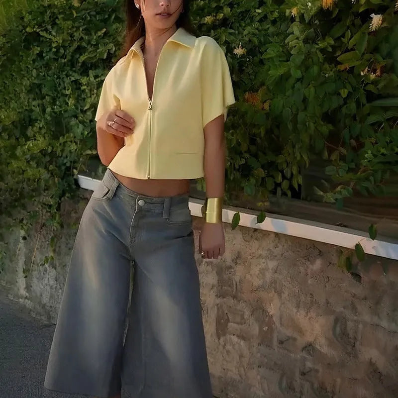 Man wearing a loose-fit yellow short sleeve casual polyester top.