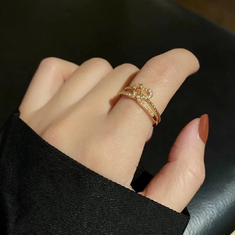 Women's love ring in gold electroplated copper with geometric shape and Korean style design