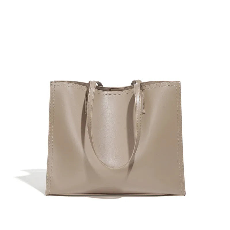 Brown genuine leather women's one shoulder handbag with a horizontal square shape.