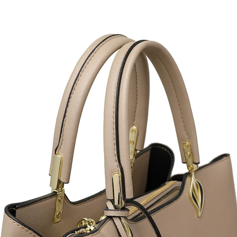 Women's black PU leather messenger bag with multi-layer shoulder design and sewing thread detailing