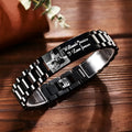 Titanium steel men's bracelet with curved heart shape design and black lettering on grey background