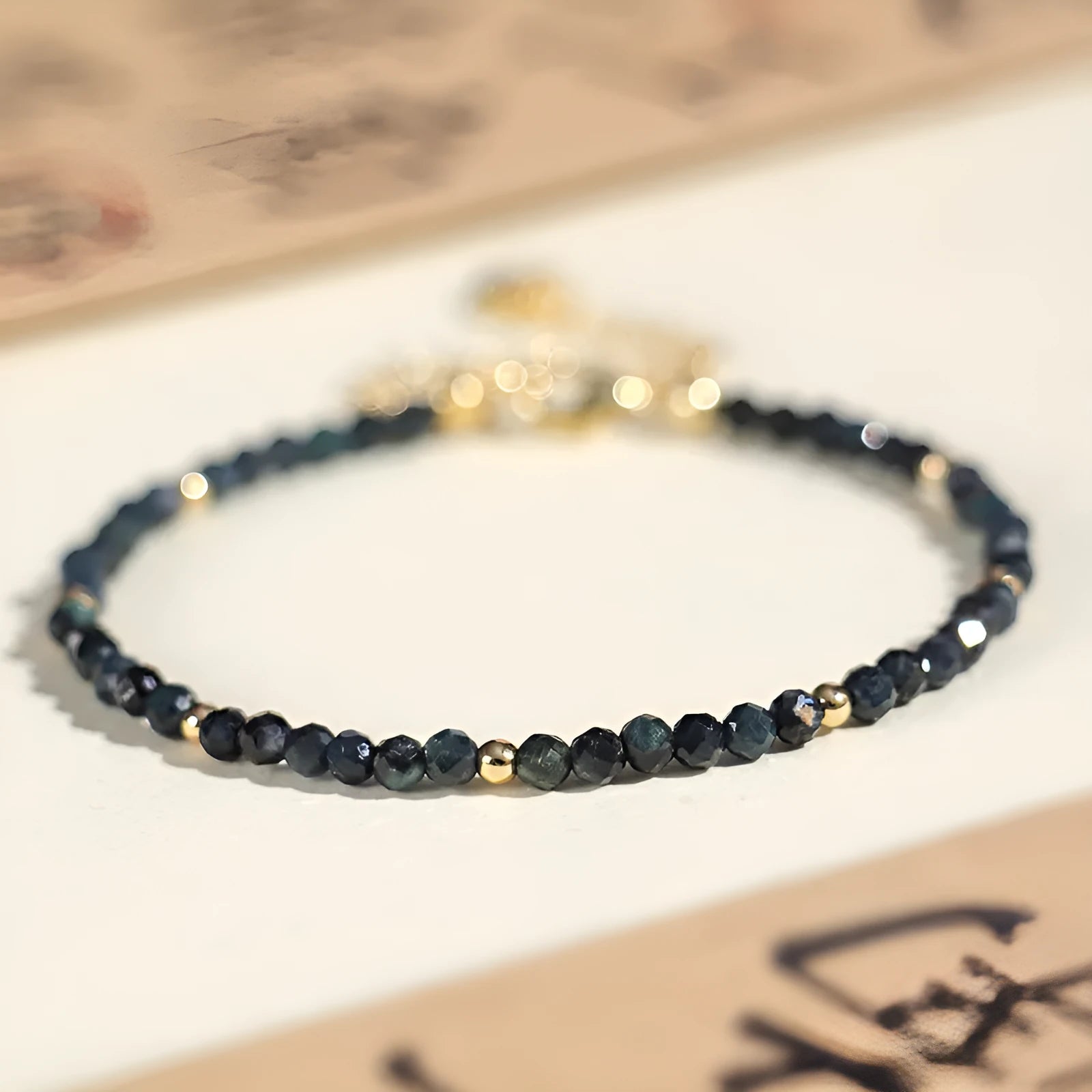 Blue tourmaline beaded bracelet with 3mm gemstone beads and spacer detailing