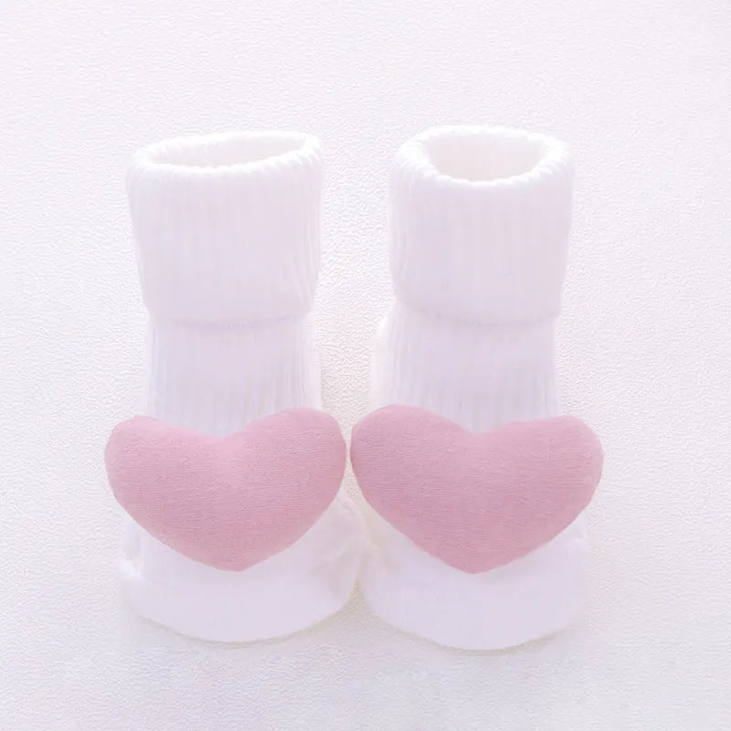 Baby socks in cotton with breathable sweat-absorbing features, available in multiple colours and XS S M sizes for infants