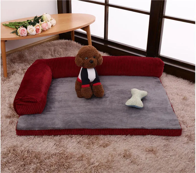 Corduroy pet sofa dog bed in grey with raised sides on a wooden floor