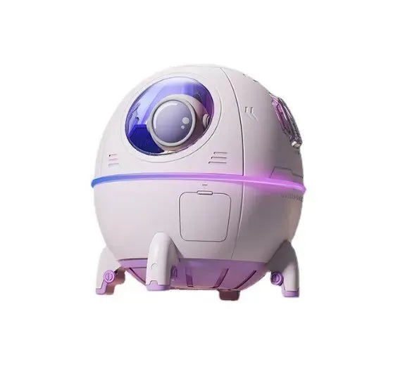 Light purple astronaut-shaped desktop humidifier with LED lights and USB cable