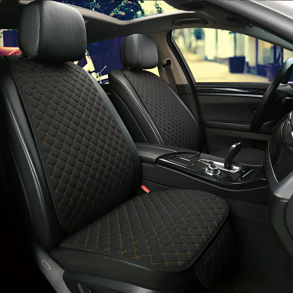 Linen universal car seat cushion with backrest in warm cream colour on a car seat.