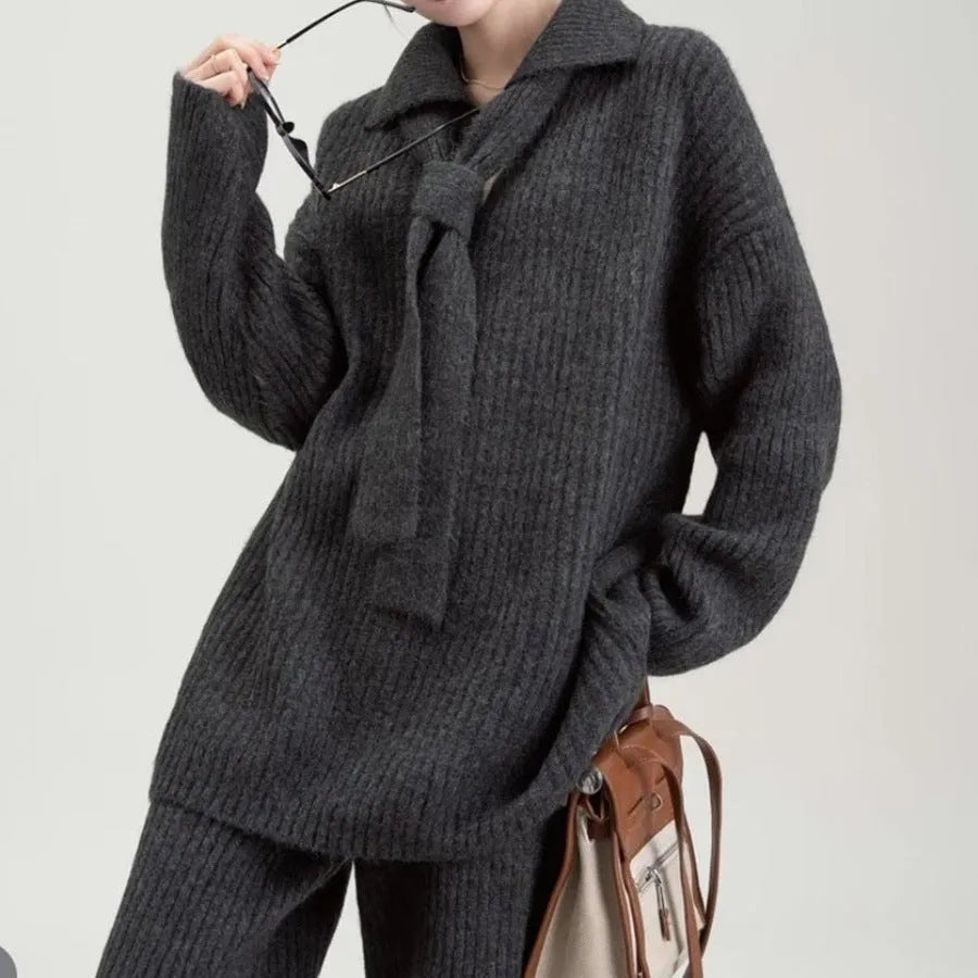 Acrylic knit sweater suit two-piece set showing top and trousers in beige colour