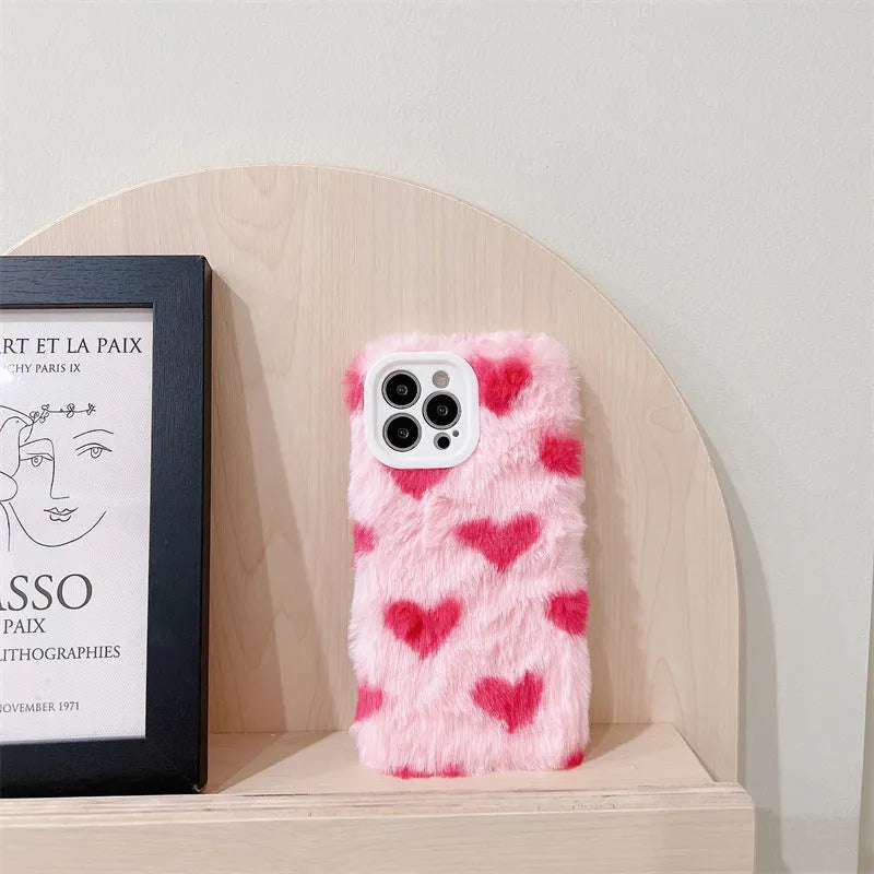 Pink silicone iPhone case with a cartoon design on the back cover.