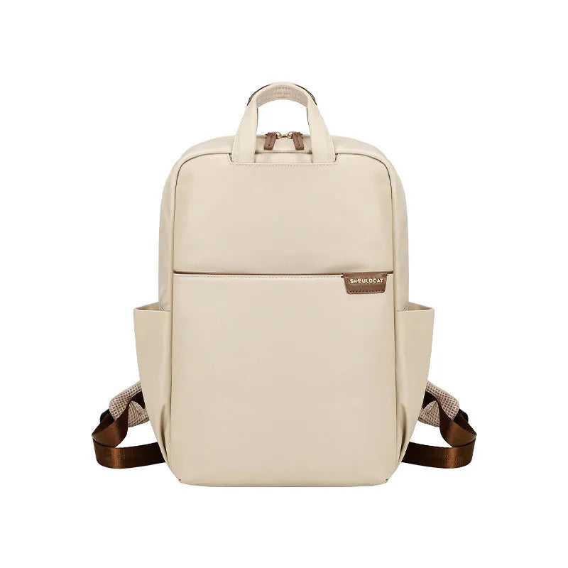 Canvas travel backpack for women in pink, black, or apricot with laptop sleeve and multiple internal pockets.