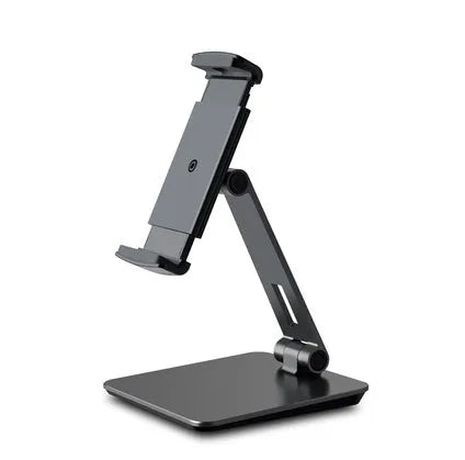 Silver aluminium folding phone and tablet stand on a desk, holding a tablet
