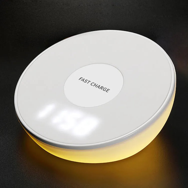 White wireless charging pad with digital clock display and control buttons for QI smartphone charging