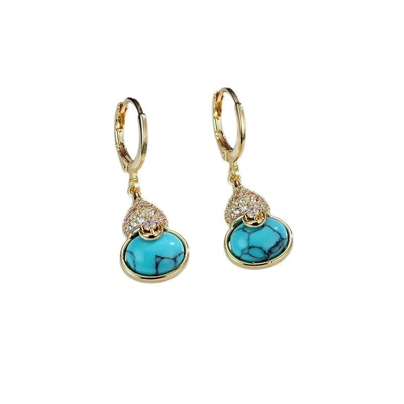 Turquoise gourd flower shape earrings and necklace set on display showing 18K gold plated brass finish