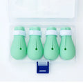 Green silicone cat anti-scratch foot covers with adjustable straps for pet handling