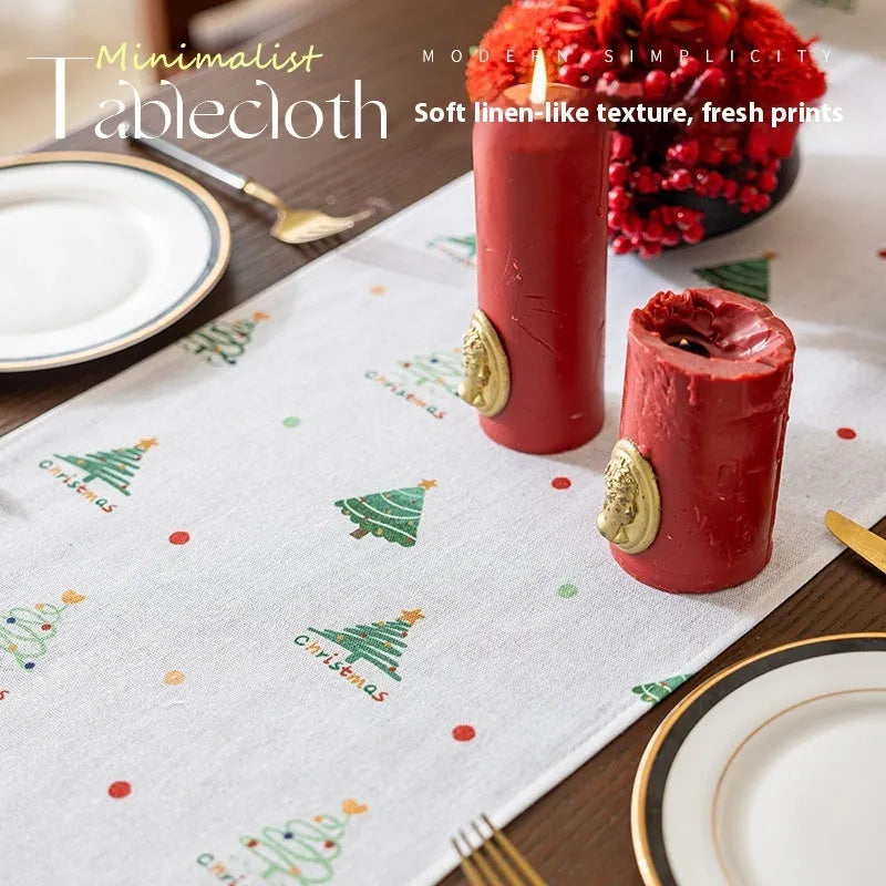 Green Christmas table runner with tree pattern on a dining table, 35cm wide polyester imitation linen