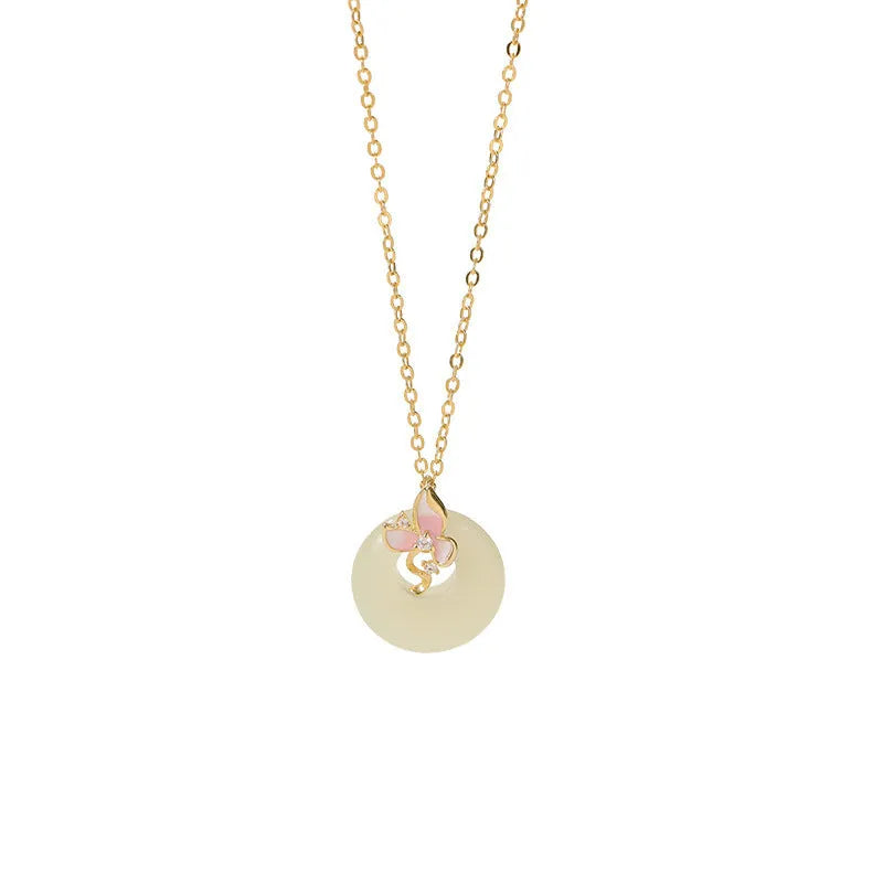 Silver orchid necklace for girls with floral geometry pendant and a secure peace buckle clasp on an O-ring chain.