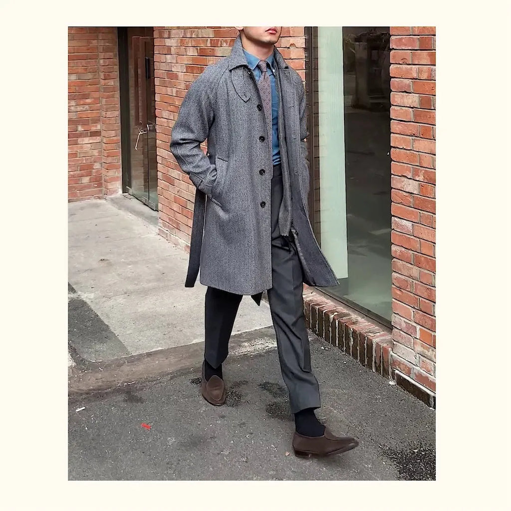 Men's herringbone wool slim fit mid length coat in blue with lapel collar and single-breasted placket