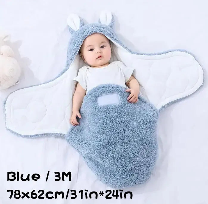 Adjustable baby sleeping bag swaddle blanket showing velcro wings and leg positioner in blue colour